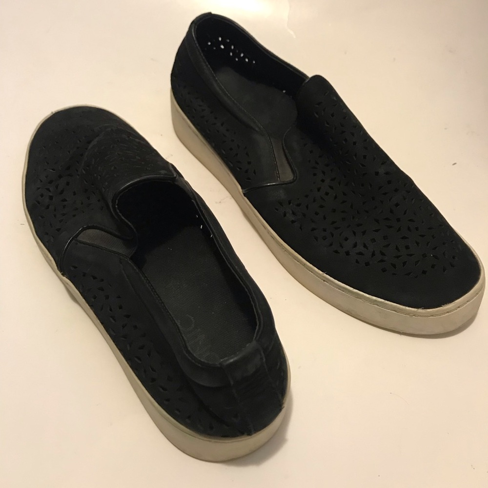 Women’s Vionic black leather laser cut shoe size not listed but shoe fits 9 1/2